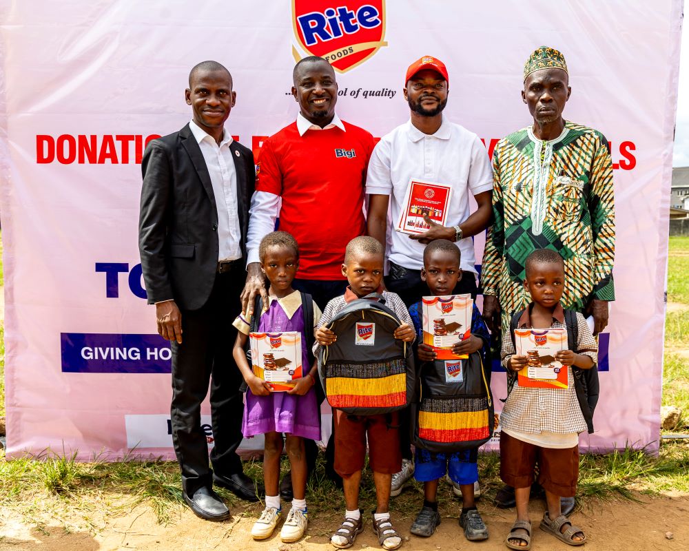 From Left: Ismail Ganiyu, Head, Human Resources; with Ekuma Eze, Head, Corporate Affairs and Sustainability; Olalere Jamal Olawale, Production Supervisor, all of Rite Foods Limited; and Idris Mukailia Olakunle, Head Teacher, Moslem Primary School, Ososa, Ogun State; during the donation of school bags and exercise books by Rite Foods Limited to pupils of Moslem Primary School, on Wednesday, 28th May 2025, as part of its corporate social responsibility (CSR) initiative in commemorating the Children’s Day celebration, where 2,000 school bags and 4,000 exercise books were donated to primary school pupils in Ogun and Lagos States, including the Federal Capital Territory, Abuja.